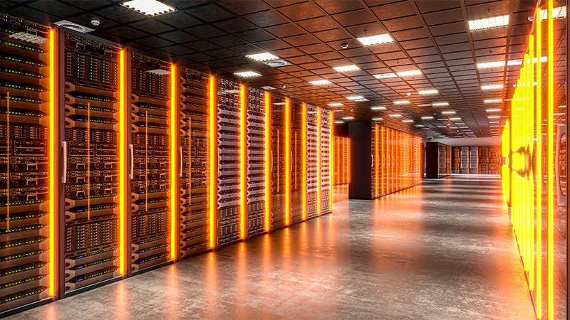 Symbolizing the power of technology and data storage: server racks in a modern data center glowing with orange lights